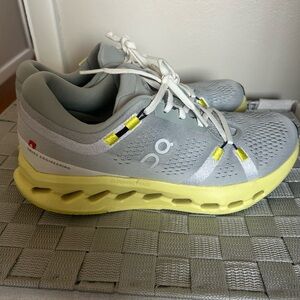 On Running Light Gray and Soft Yellow Shoes